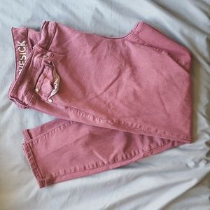 Lovesick (Torrid) jeans in maroon